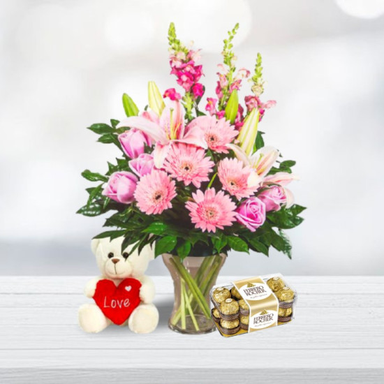 Assorted Gerberas In Glass Vase With Teddy And Chocolate